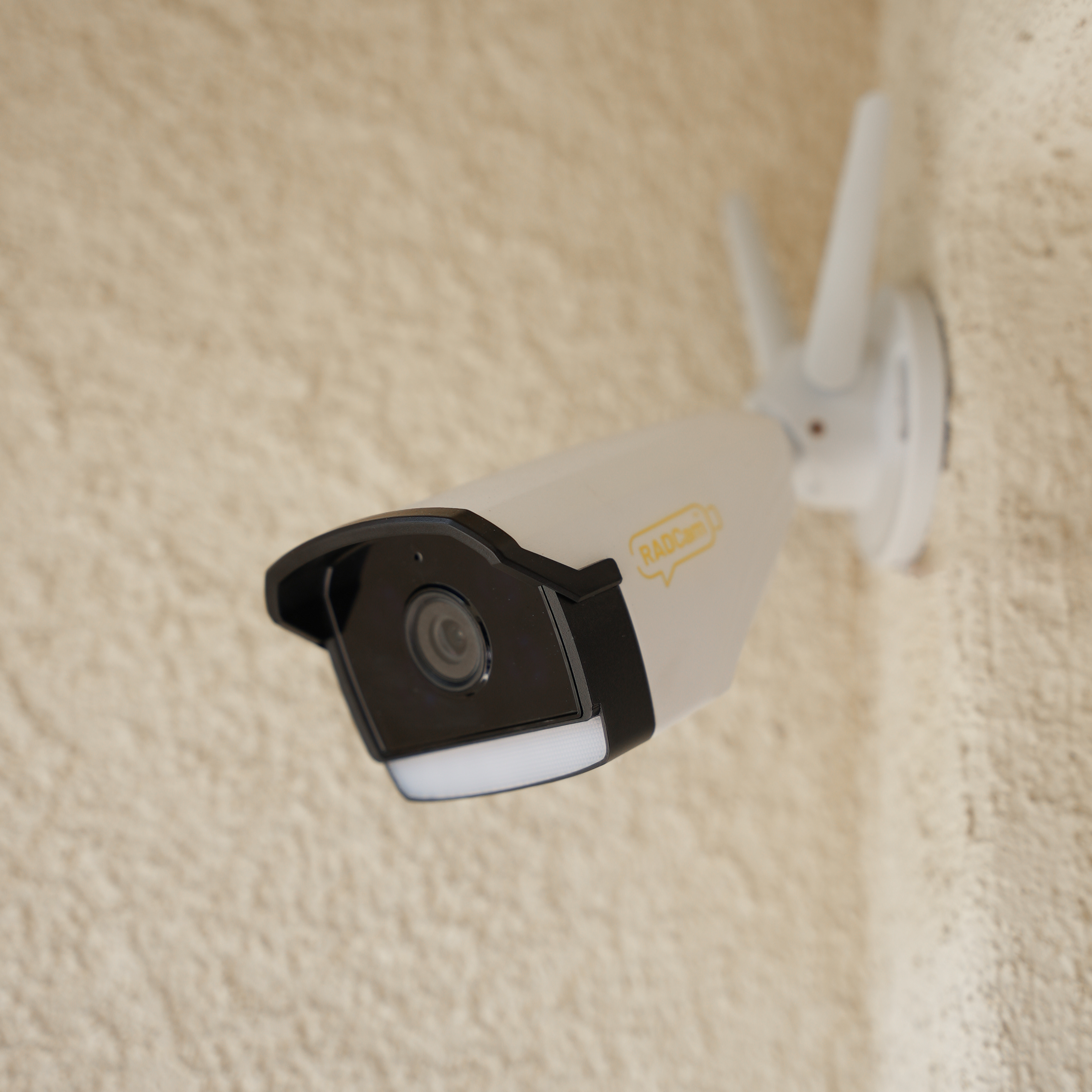 Galaxy Security RADCam outdoor security camera mounted on a wall, showing a sleek black design for home surveillance.