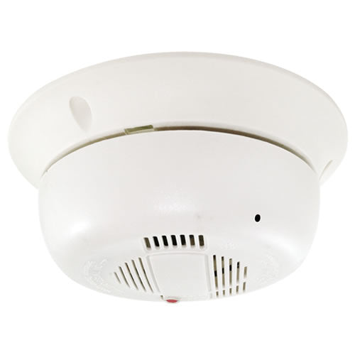 Galaxy 720P HD-CVI spy smoke detector hidden camera with discreet design and small lens, installed in a smoke detector unit.