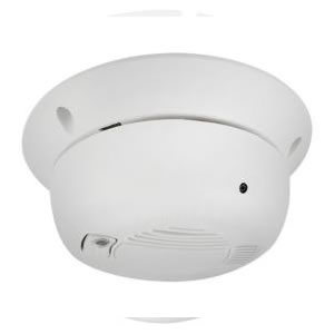 2MP TVI real functional smoke dome security camera with 3.7mm lens, capturing clear surveillance footage in outdoor or indoor settings.